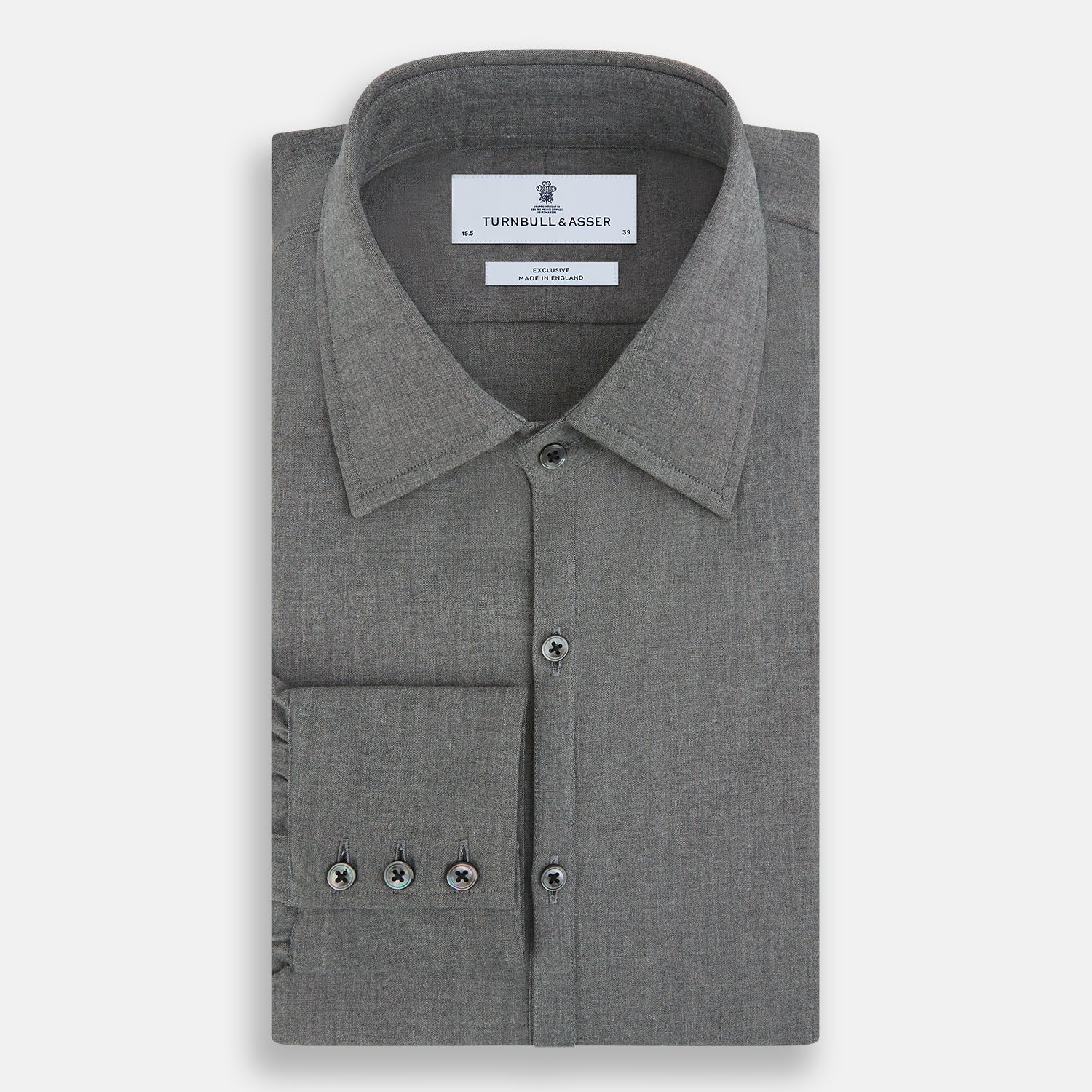 Image 5 of product The Pale Charcoal Westminster Shirt by Turnbull & Asser features British craftsmanship with a tailored silhouette, long sleeves, pointed collar, buttoned cuffs, and a solid pale charcoal hue, elegantly shown against a white background.