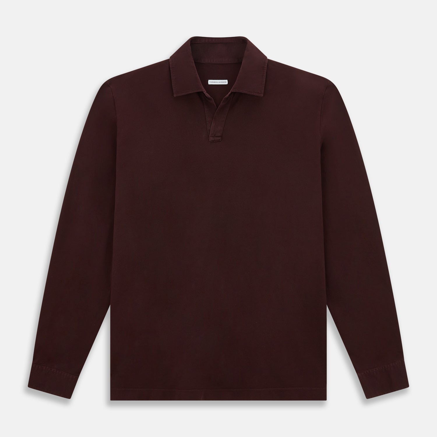 Image 1 of product The Turnbull & Asser Burgundy Rugby Polo Shirt is a long-sleeve, pure cotton collared top with no visible buttons, shown laid flat on a white background.