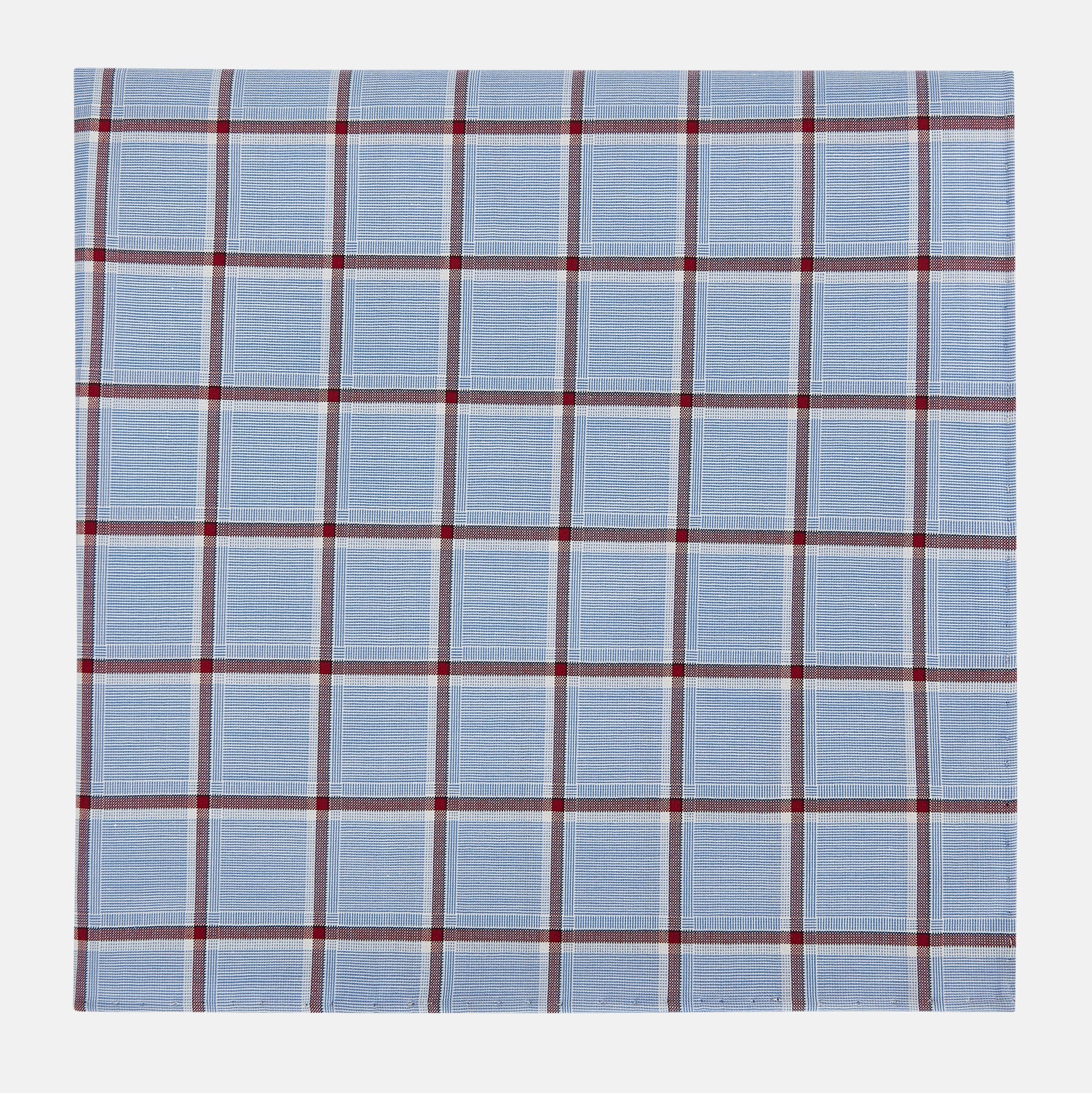 Image 1 of product The Turnbull & Asser Blue and Burgundy Windowpane Check Hand-Rolled Handkerchief features a light blue fabric with white, red, and dark blue stripes forming a classic plaid grid.