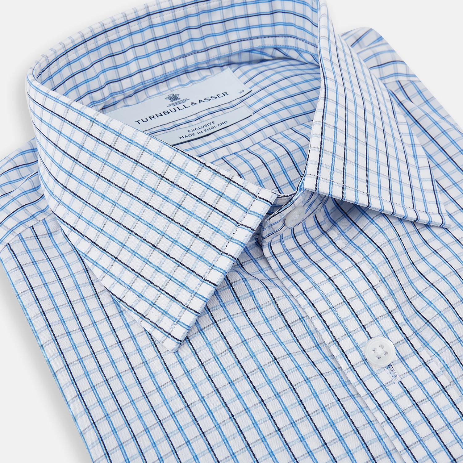 Image 2 of product The Turnbull & Asser Blue and Navy Tattersall Check Mayfair Shirt features long sleeves, a button-up front, and a T&A collar in the classic Mayfair fit, shown flat against a white background.