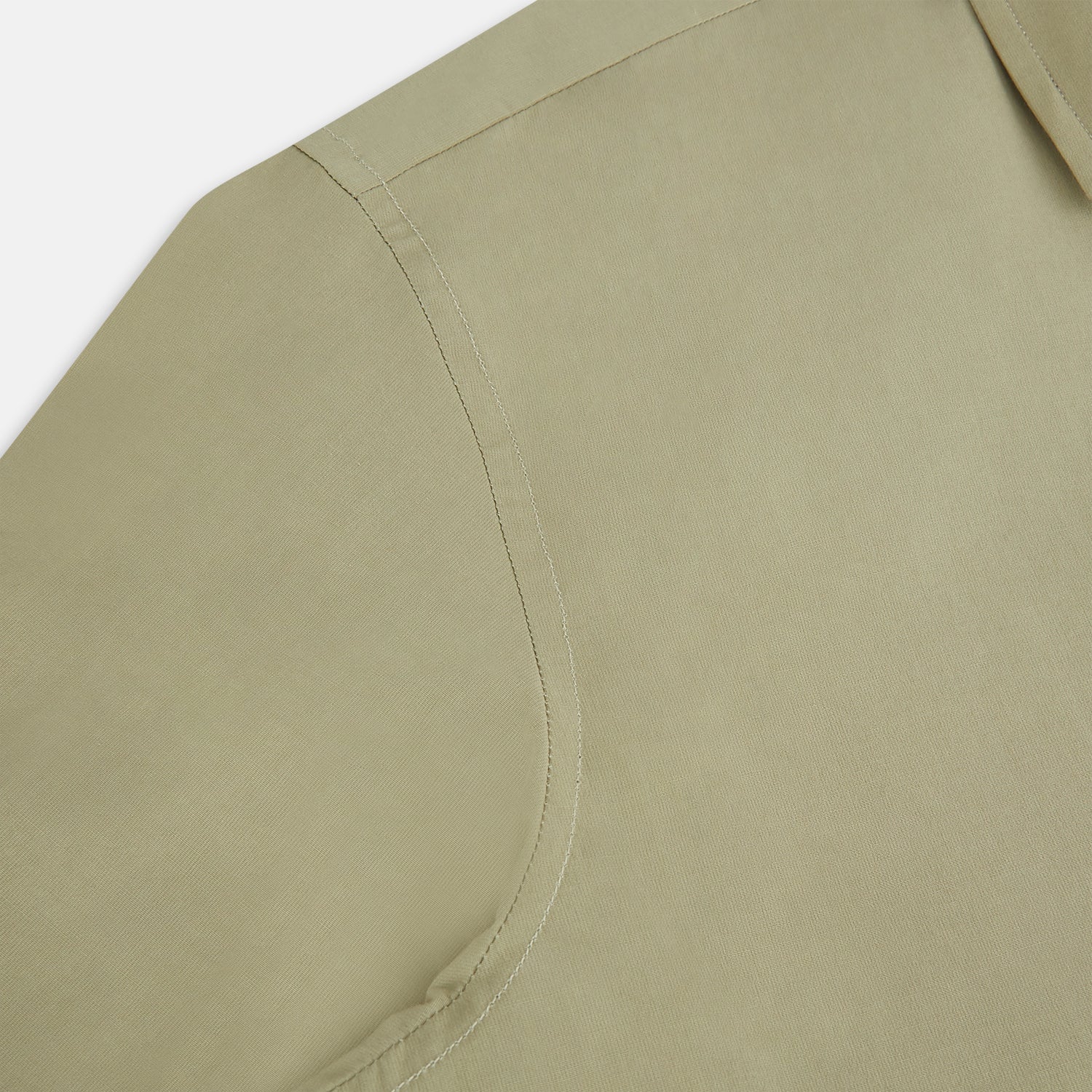 Image 6 of product The TAUPE WINDSOR SHIRT by Turnbull & Asser features a Windsor collar and buttoned cuffs. This long-sleeve shirt showcases refined British design and is displayed flat on a white background.