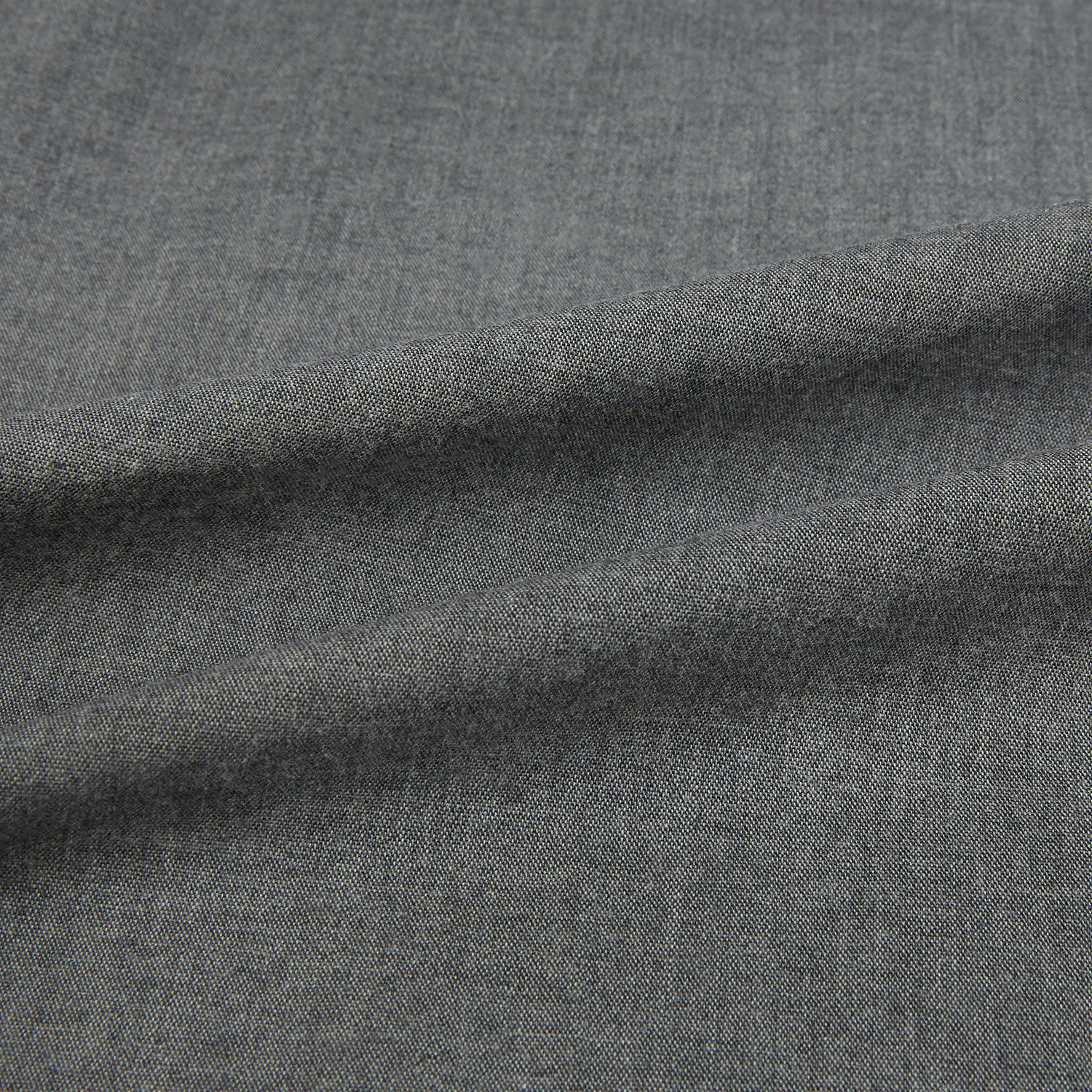 Image 8 of product The Pale Charcoal Westminster Shirt by Turnbull & Asser features British craftsmanship with a tailored silhouette, long sleeves, pointed collar, buttoned cuffs, and a solid pale charcoal hue, elegantly shown against a white background.