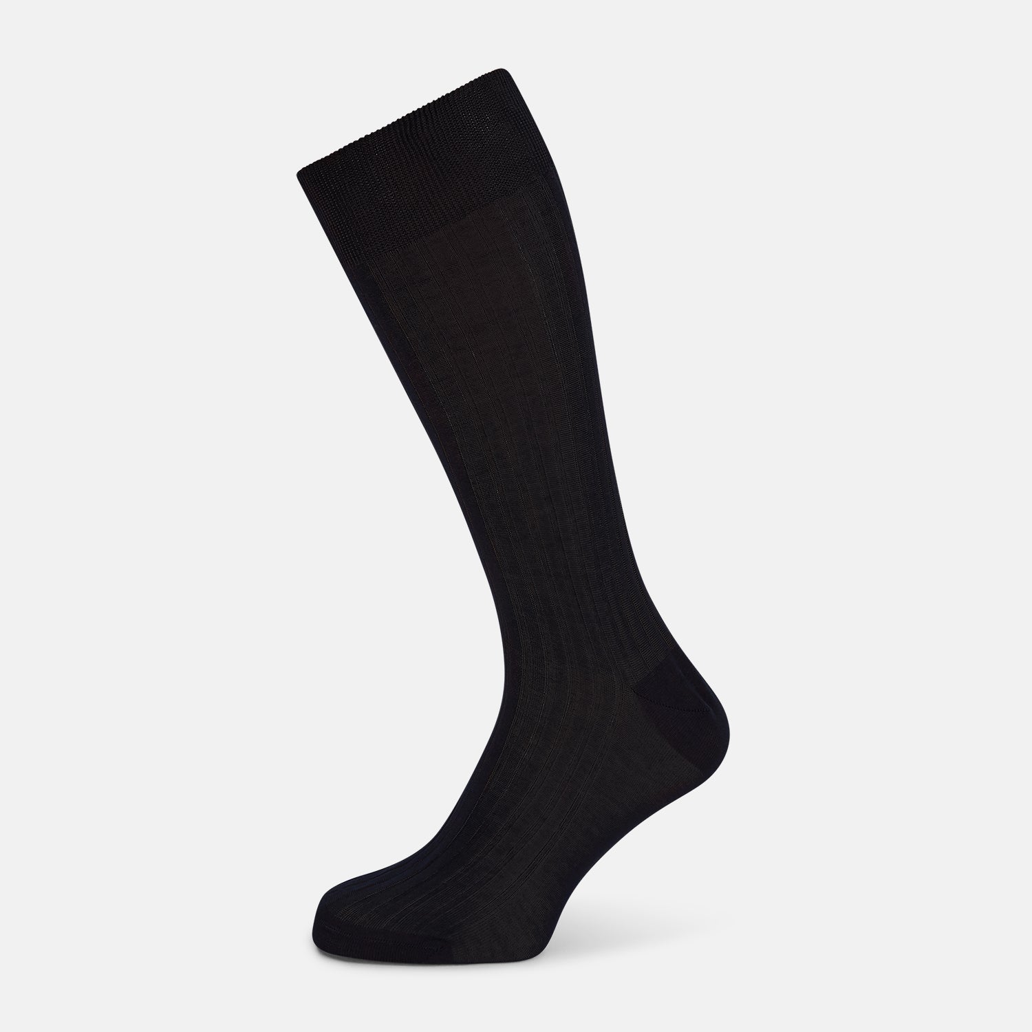 Image 1 of product A single Midnight Mid-length Sock by Turnbull & Asser, made from mercerised Egyptian cotton, stands upright on a white background. This luxury black sock features a ribbed texture with smooth toe and heel areas.