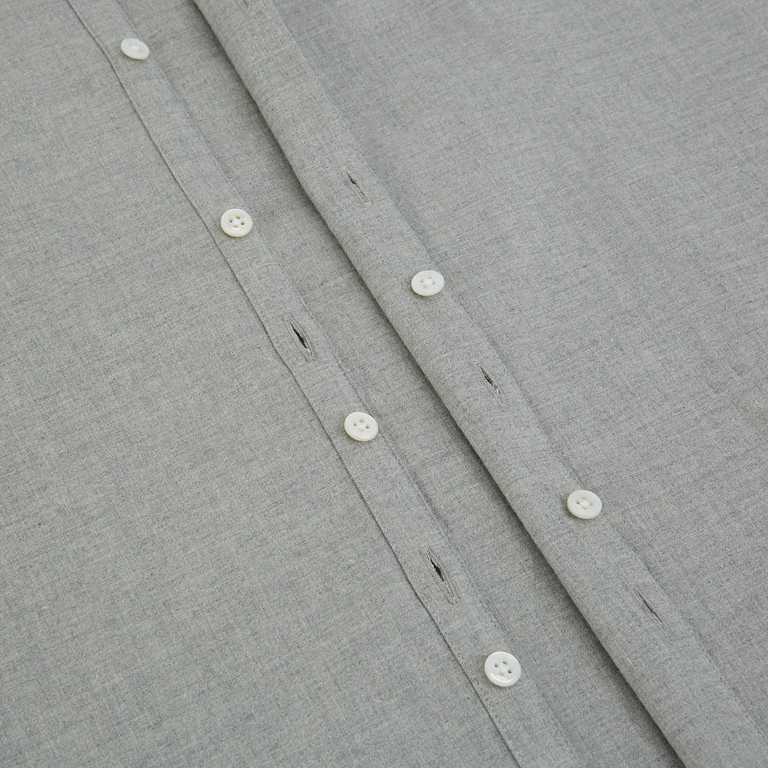 Image 7 of product The Grey Westminster Shirt by Turnbull & Asser features a classic collar and white buttons, expertly crafted in Britain. This long-sleeve button-up is shown against a plain white background.