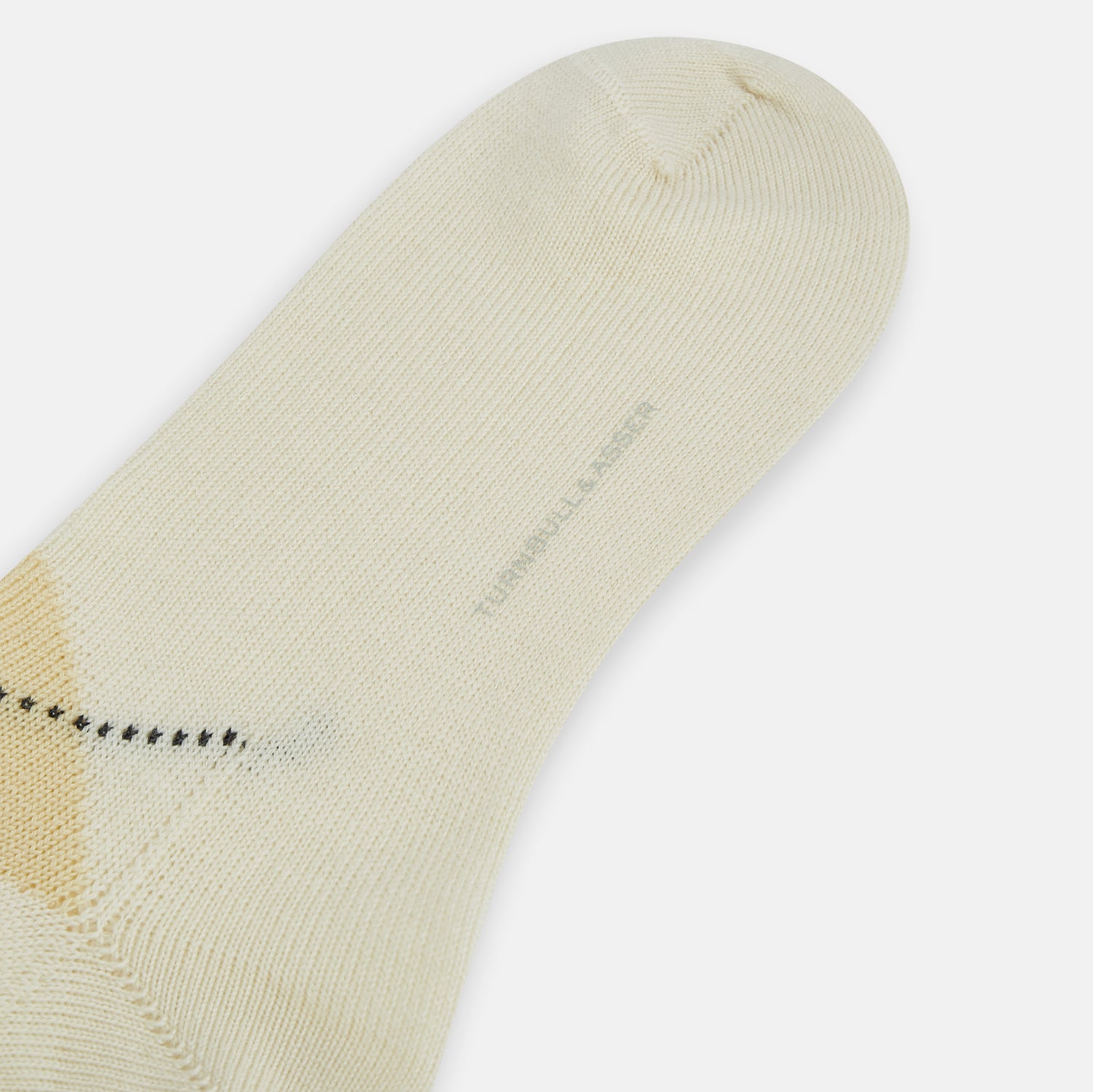 Image 3 of product A single Turnbull & Asser White Wool Check Mid-Length Sock, featuring a subtle check pattern in tan, cream, and light brown shades, is displayed on a plain white background.