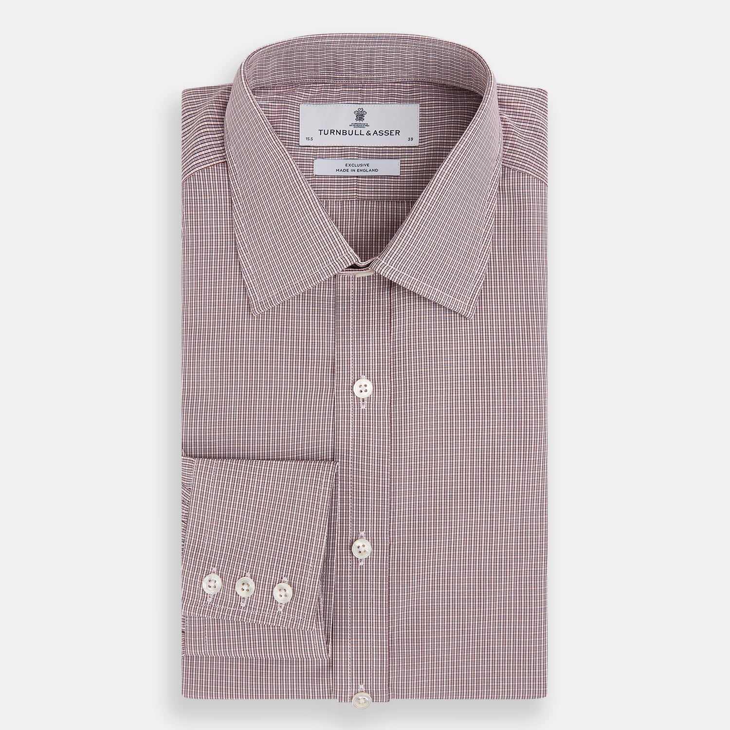 Image 5 of product The Turnbull & Asser Burgundy Micro Shadow Check Mayfair Shirt features long sleeves, a classic collar, and white buttons. In light red and white shades, this button-up is perfect for formal wear and is shown laid flat against a white background.