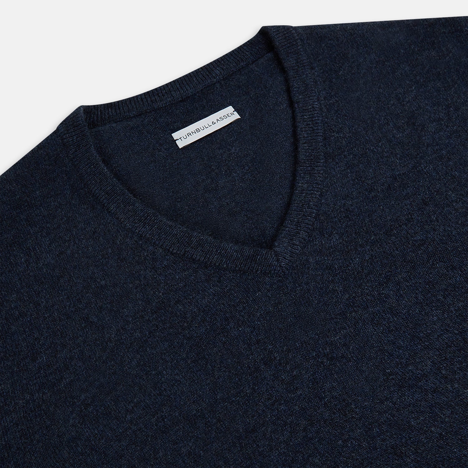 Image 2 of product The Turnbull & Asser Navy Melange Cashmere V-Neck Jumper from our knitwear collection is shown against a white background.