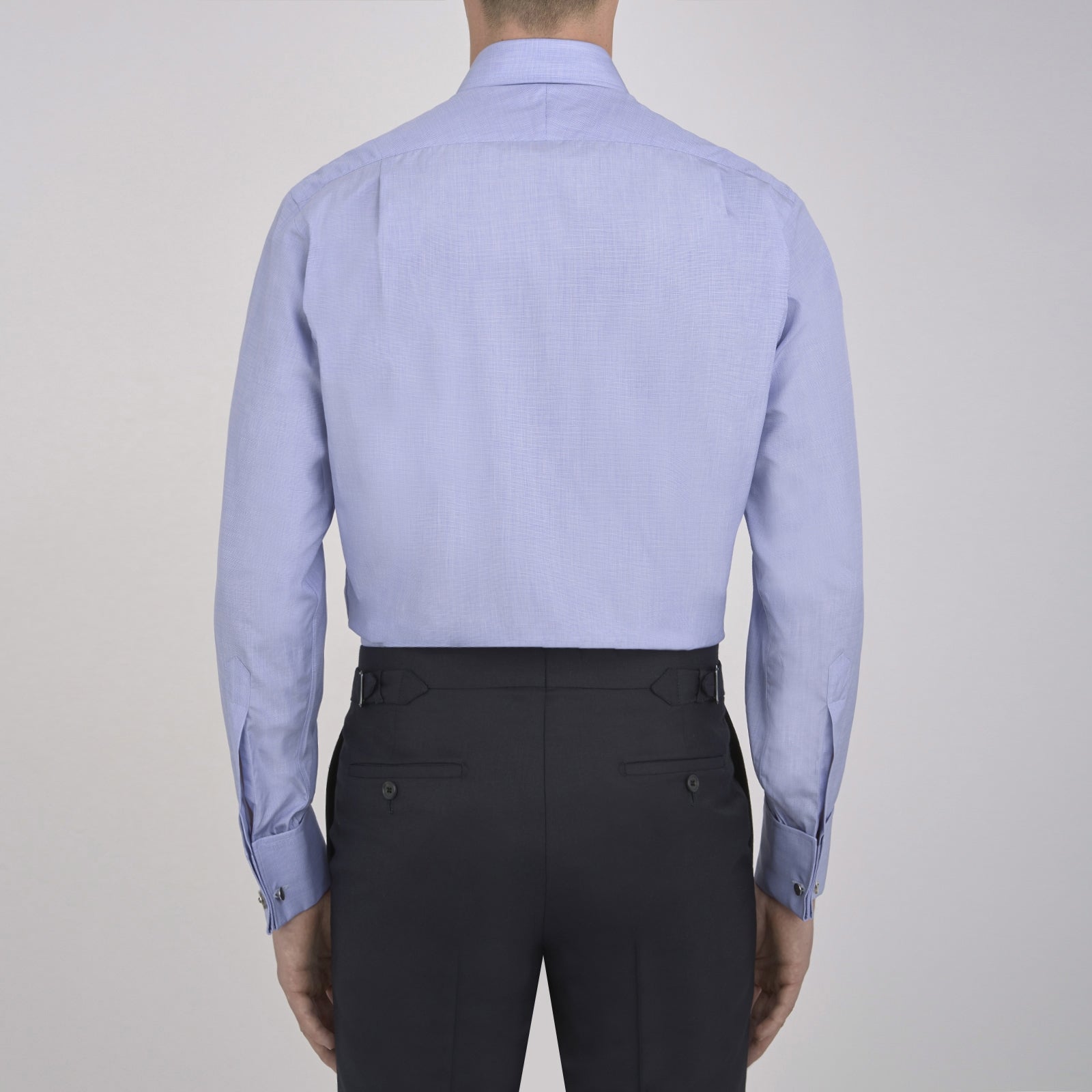 Image 6 of product The Turnbull & Asser Blue End-on-End Cotton Shirt features a T&A collar, double cuffs, and white buttons—ideal for smart looks or pairing with a navy suit. Displayed against a plain white background.