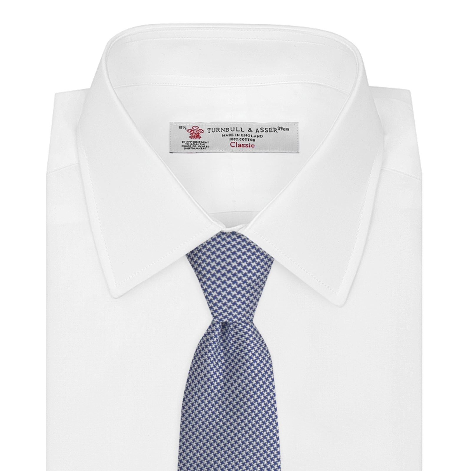 Image 2 of product The Turnbull & Asser Blue Houndstooth Silk Tie features a classic blue and white pattern, rolled and displayed on a white background—an elegant accessory for your favorite office shirt.