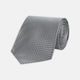 The Turnbull & Asser Grey and White Diamond Silk Tie, featuring a subtle textured pattern, is perfect for pairing with an office shirt and is displayed against a white background.