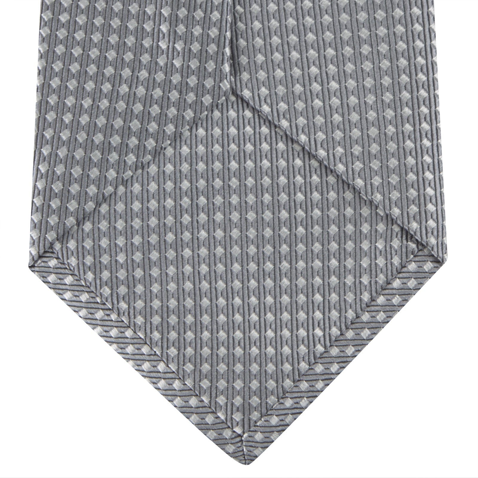 Image 4 of product The Turnbull & Asser Grey and White Diamond Silk Tie, featuring a subtle textured pattern, is perfect for pairing with an office shirt and is displayed against a white background.