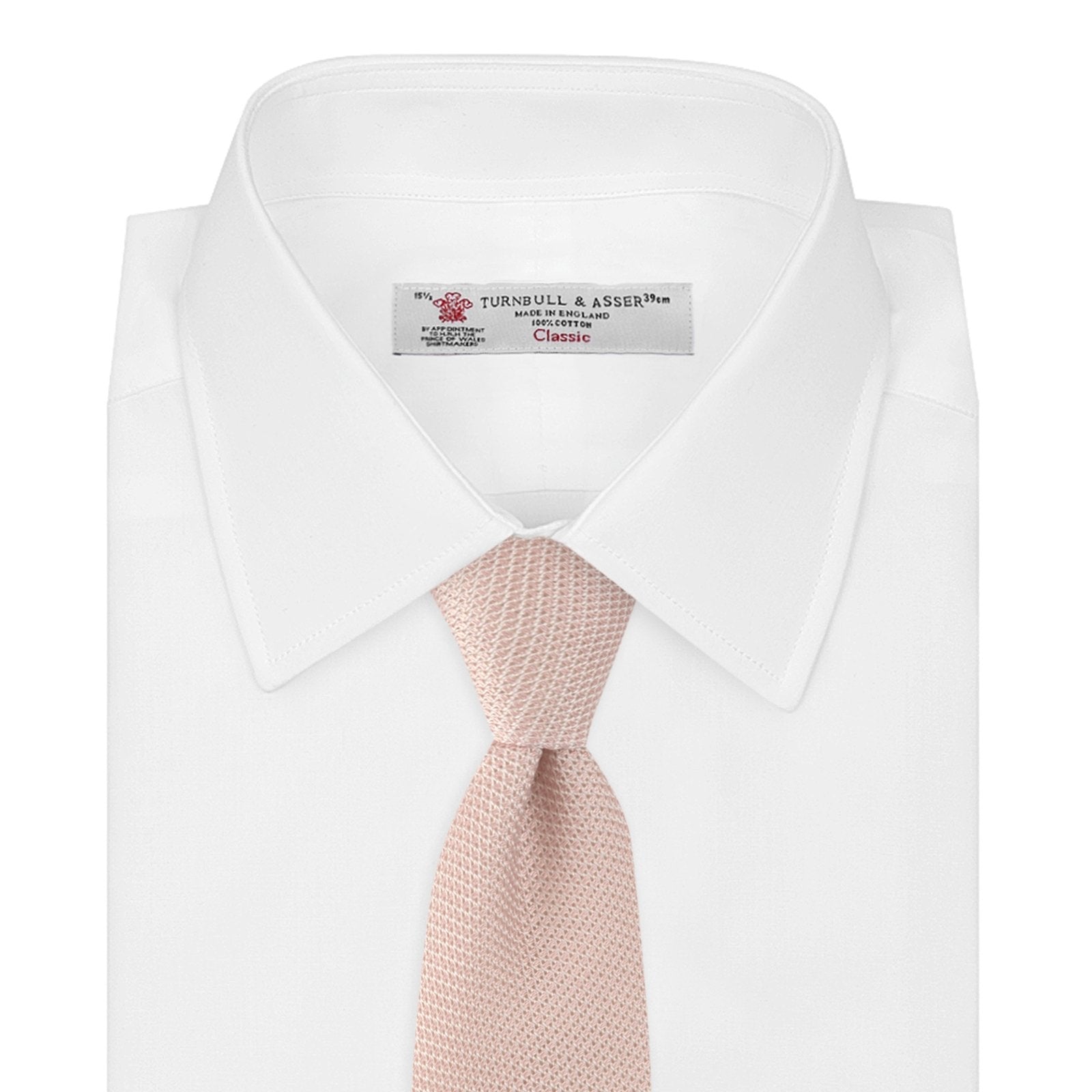Image 2 of product The Turnbull & Asser Light Pink Grenadine Silk Tie features a subtle woven pattern, shown rolled up on a plain white background.