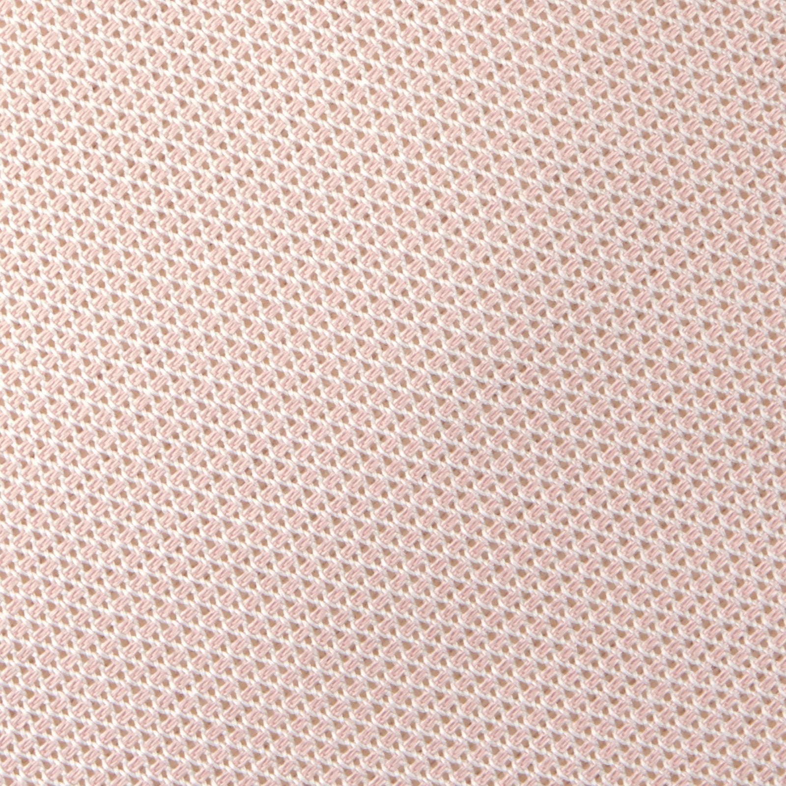 Image 3 of product The Turnbull & Asser Light Pink Grenadine Silk Tie features a subtle woven pattern, shown rolled up on a plain white background.