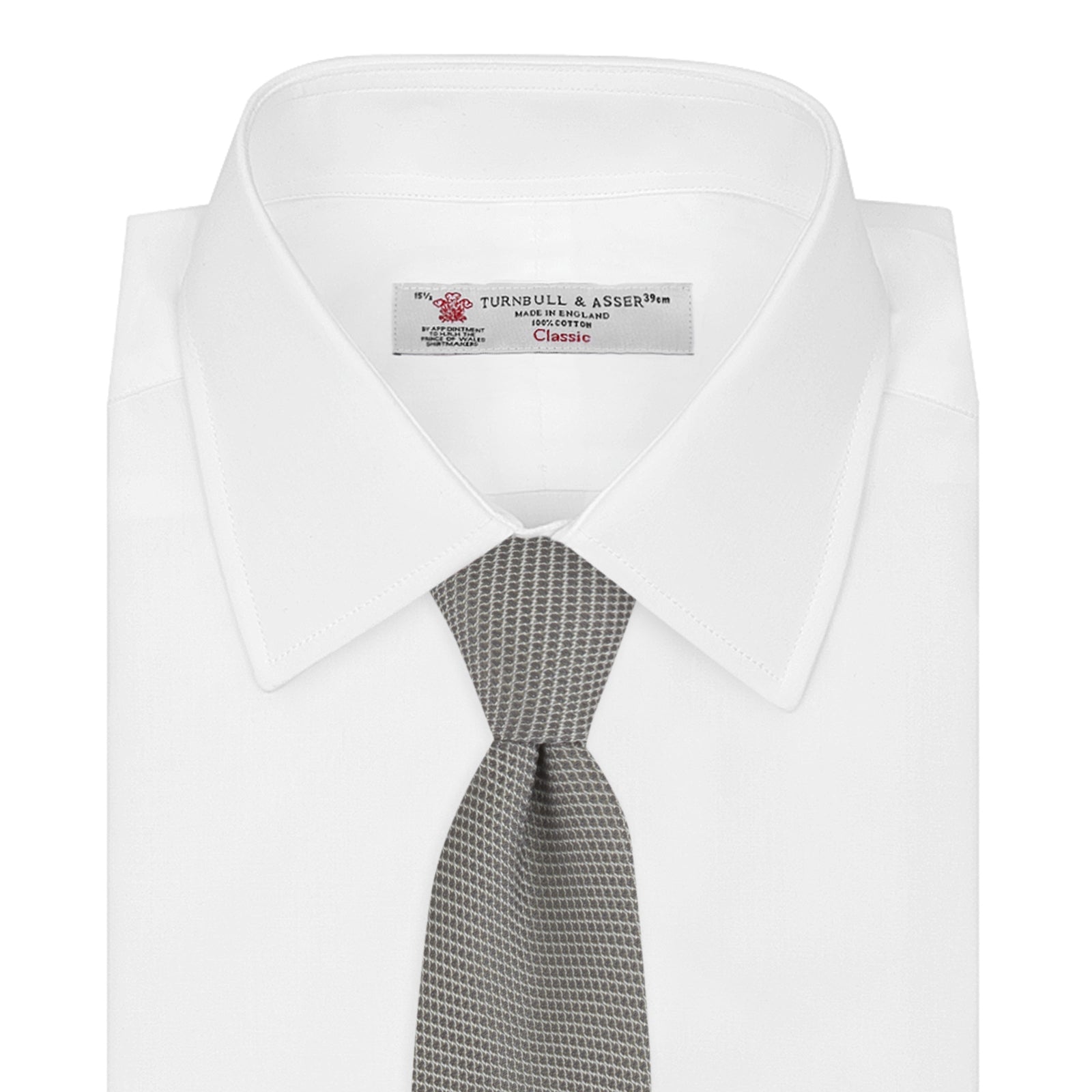 Image 2 of product The Turnbull & Asser Light Grey Grenadine Silk Tie features a finely textured checkered pattern and superb dimensional stability, shown rolled up against a plain white background.