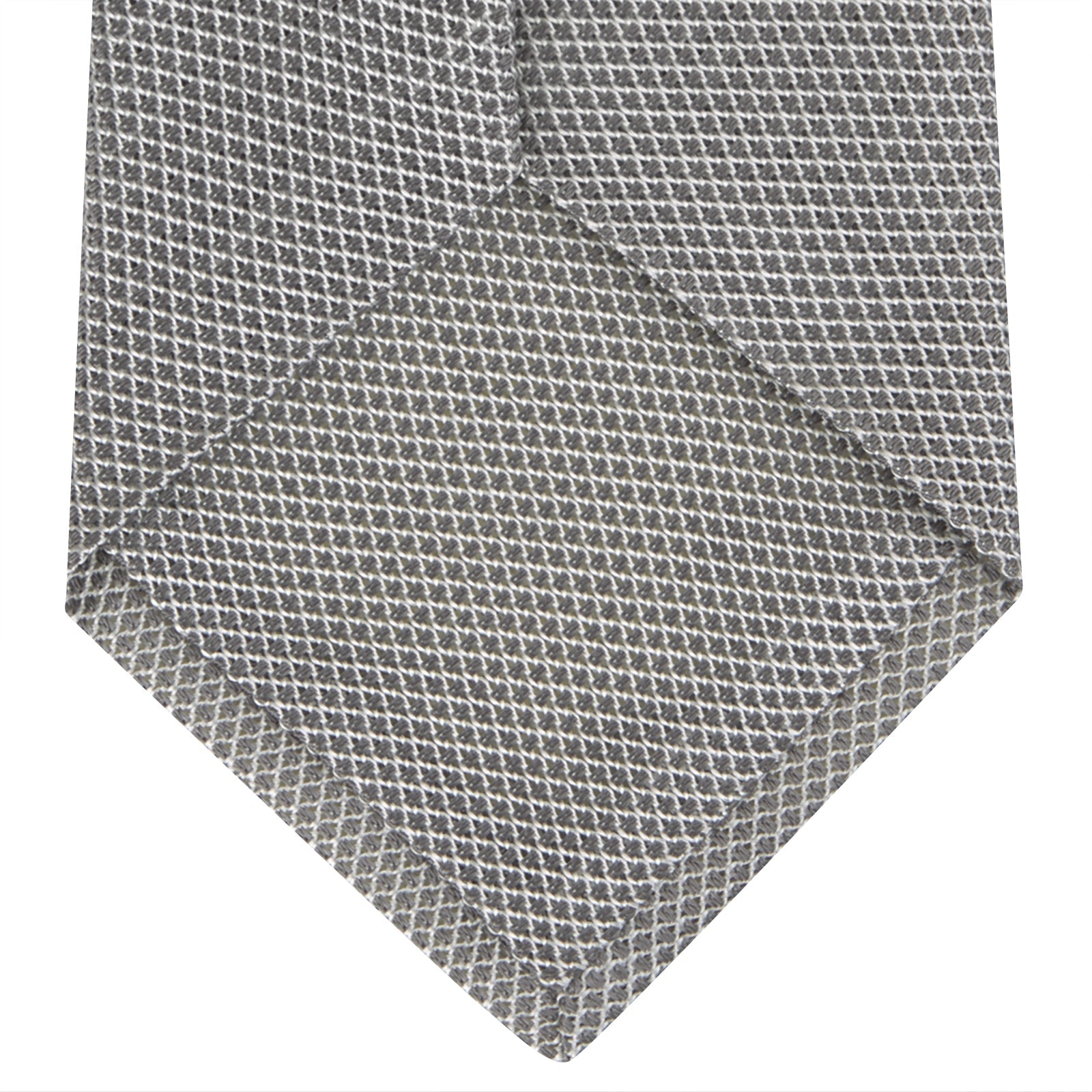 Image 4 of product The Turnbull & Asser Light Grey Grenadine Silk Tie features a finely textured checkered pattern and superb dimensional stability, shown rolled up against a plain white background.