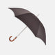 A practical accessory for unpredictable English weather, this Turnbull & Asser dark grey umbrella with a chestnut crook handle is shown elegantly against a plain white background.