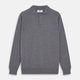 The Grey Merino Wool Cecil Rugby Polo Shirt by Turnbull & Asser features long sleeves, a collar, three-button placket, and ribbed hem and cuffs—an elevated menswear staple shown flat on a white background.