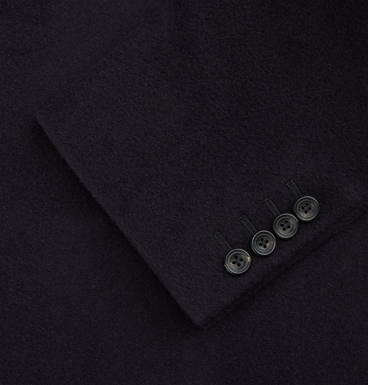 Image 4 of product The Turnbull & Asser Navy Cashmere Joseph Overcoat features notched lapels, three front pockets, buttoned cuffs, and a hidden button closure—an essential men’s outerwear piece shown against a plain white background.