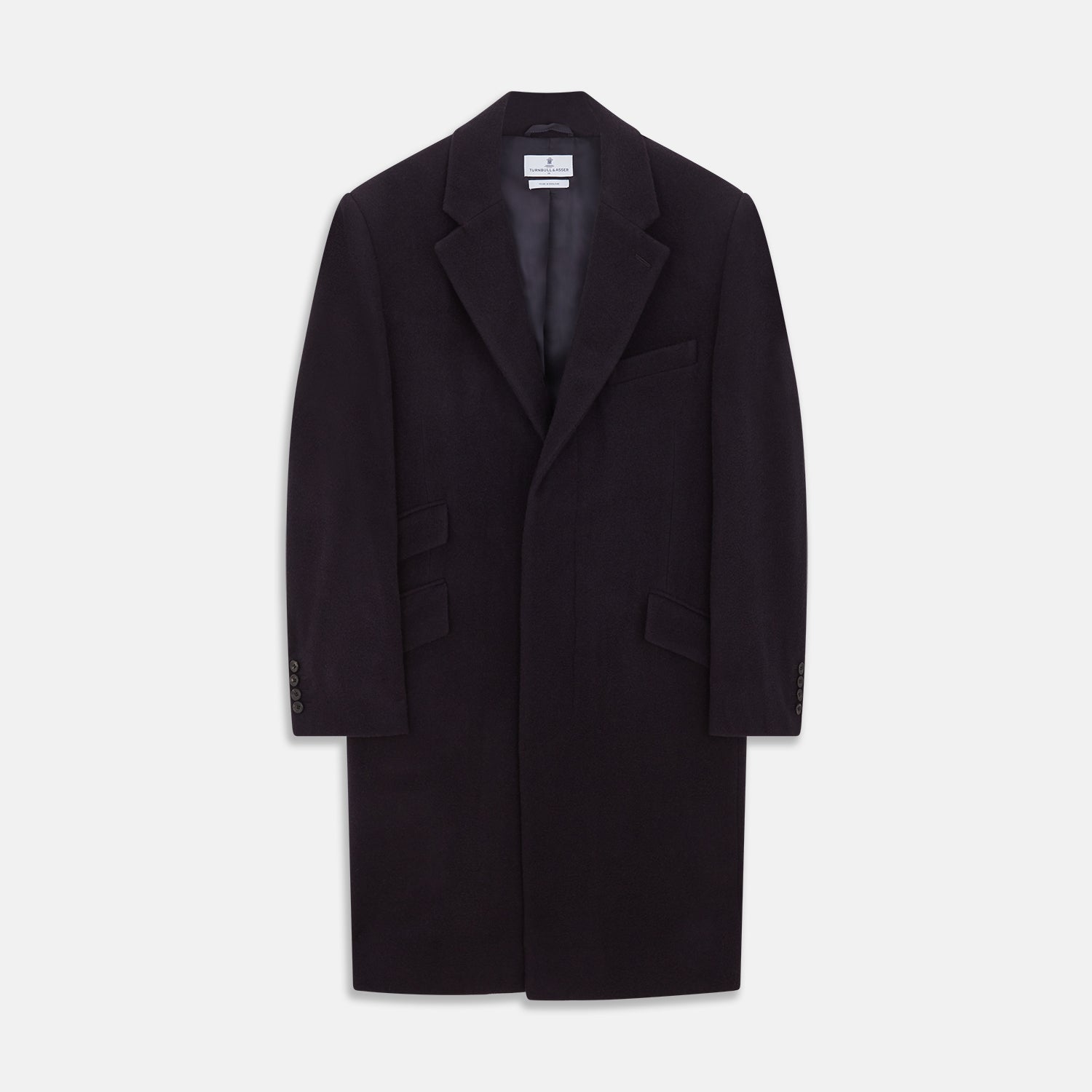 Image 1 of product The Turnbull & Asser Navy Cashmere Joseph Overcoat features notched lapels, three front pockets, buttoned cuffs, and a hidden button closure—an essential men’s outerwear piece shown against a plain white background.