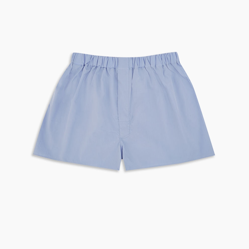Image 2 of product Turnbull & Asser Plain Blue Sea Island Quality Cotton Boxer Shorts feature premium soft cotton and an elastic waistband, shown flat against a white background.