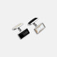 Turnbull & Asser's Reversible Monochrome Sterling Silver Rectangular Cufflinks feature black onyx on one side and white mother-of-pearl on the other, shown against a plain light gray background.