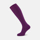 A single Magenta Long Merino Wool Sock by Turnbull & Asser is displayed side-on against a neutral background, showcasing its ribbed design, visible foot and calf, and representing the comfort and style of luxury men's socks.