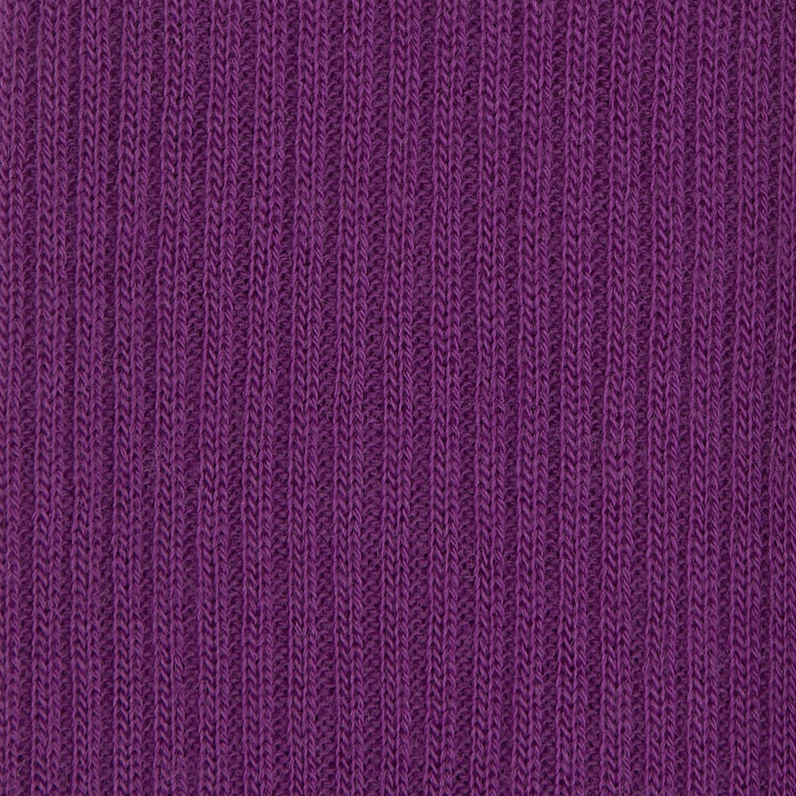 Image 2 of product A single Magenta Long Merino Wool Sock by Turnbull & Asser is displayed side-on against a neutral background, showcasing its ribbed design, visible foot and calf, and representing the comfort and style of luxury men's socks.