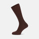 A single maroon mid-length Merino wool sock from Turnbull & Asser stands upright on a plain light gray background, highlighting its ribbed texture.