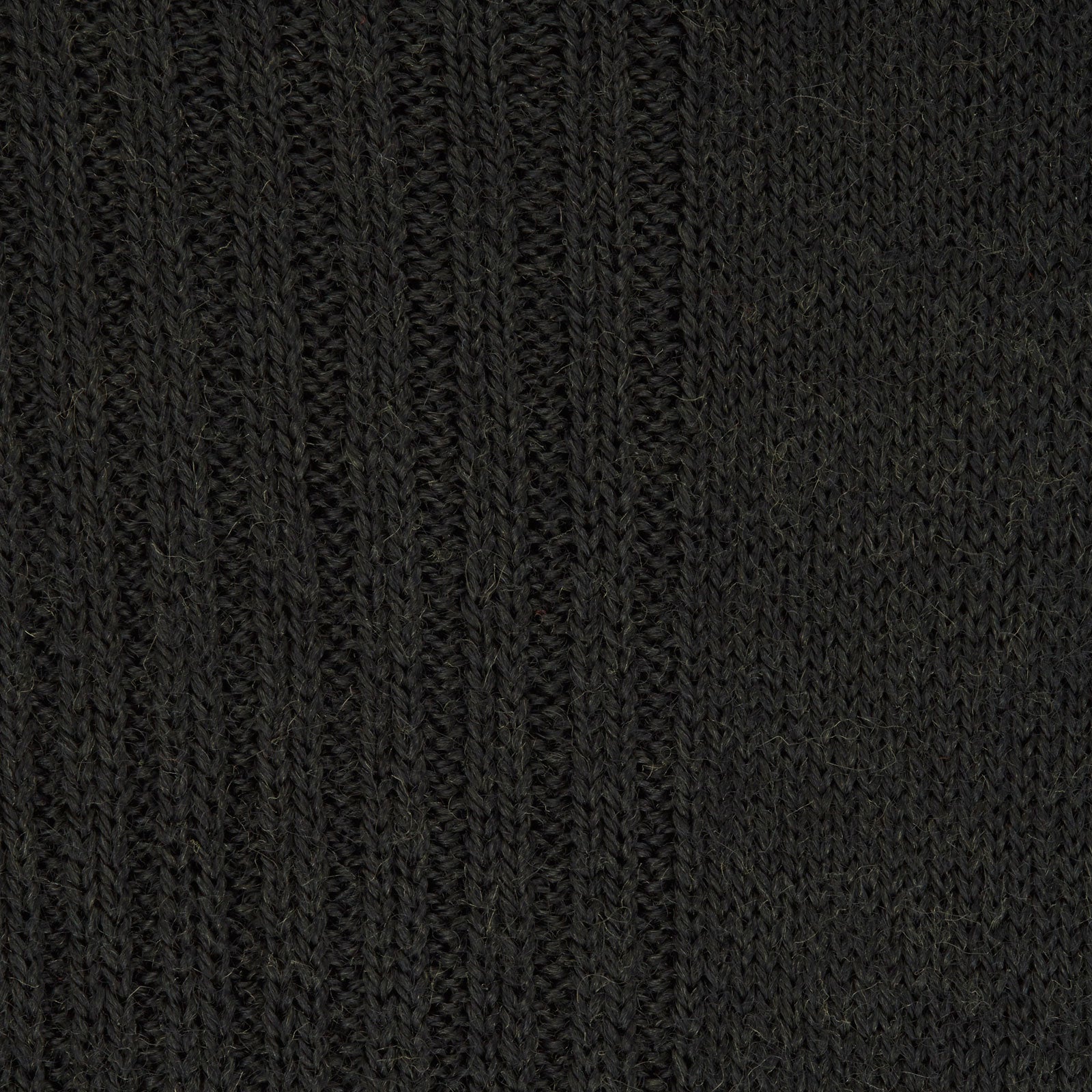 Image 2 of product The Turnbull & Asser Racing Green Mid-Length Merino Wool Sock is shown upright on a light gray background, highlighting its refined style and luxurious quality for men.