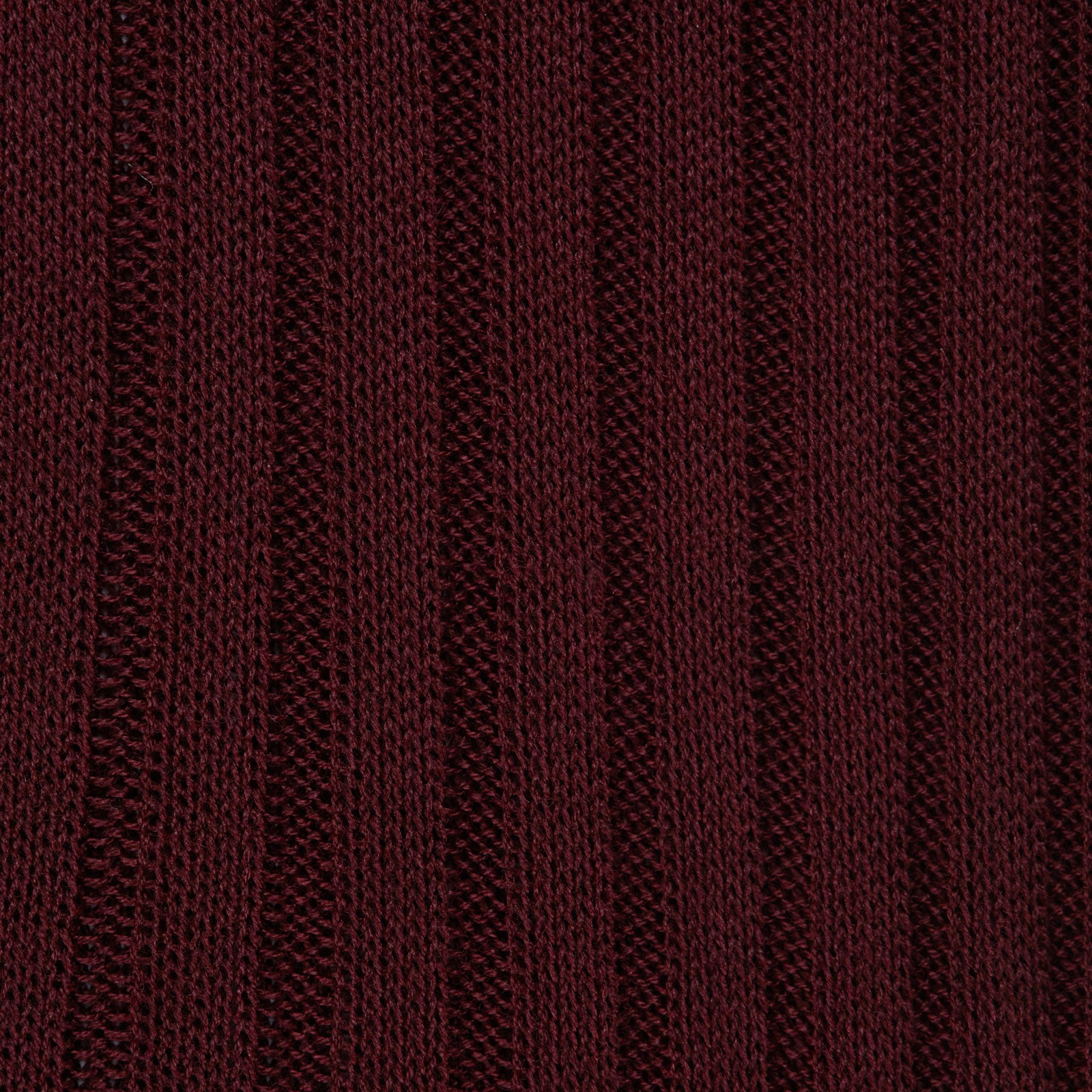 Image 2 of product The Turnbull & Asser Oxblood Long Cotton Sock, crafted from premium Fil d’Ecosse with a ribbed texture, is displayed in side profile on a white background, showcasing its luxury men’s design and rich dark brown color.