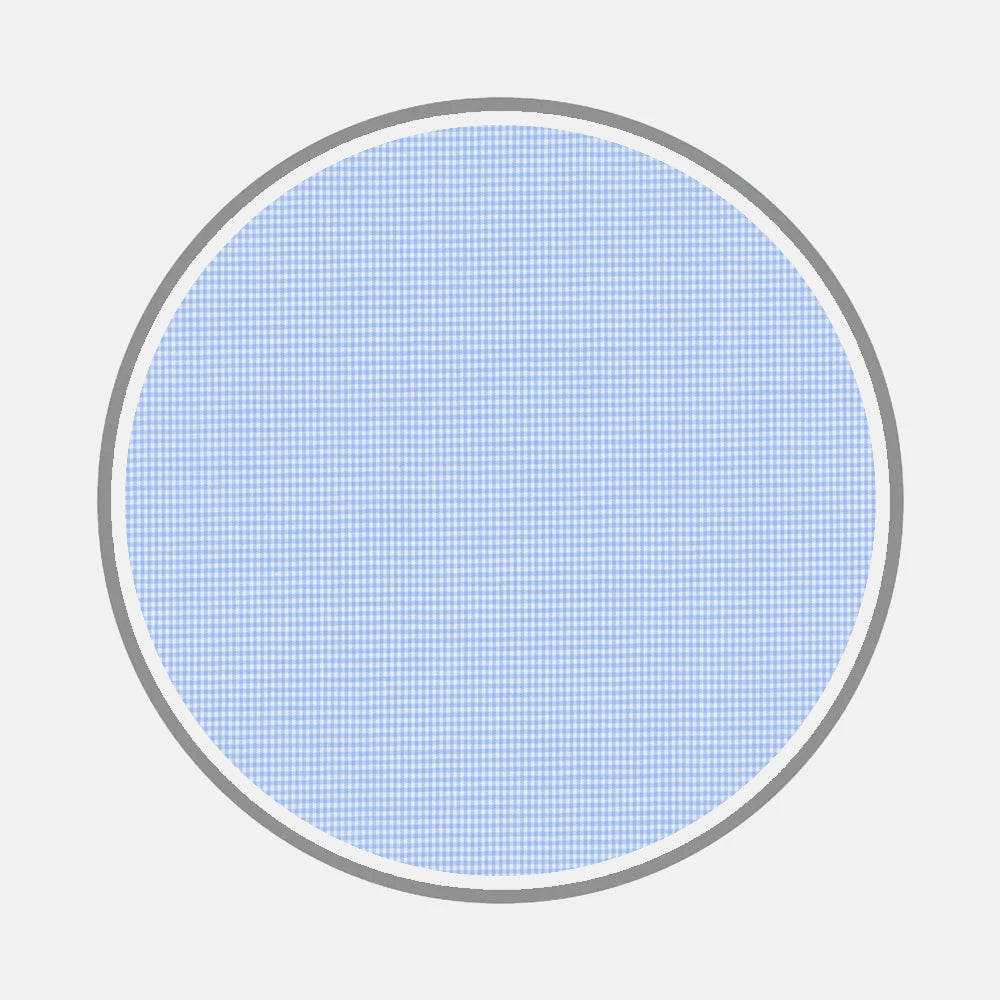 A large circle with a gray outline and dense blue grid pattern, inspired by Turnbull & Asser's Bespoke Fabric 0005 07, evokes custom shirt detailing on a plain white background.