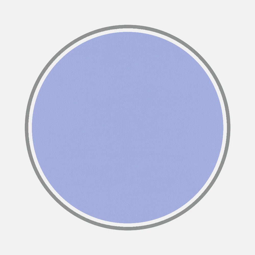 A solid light blue circle with a thin white and thick gray border, echoing bespoke shirt monograms, is centered on a plain light gray background—an aesthetic inspired by Turnbull & Asser's Bespoke Fabric 0020 50.