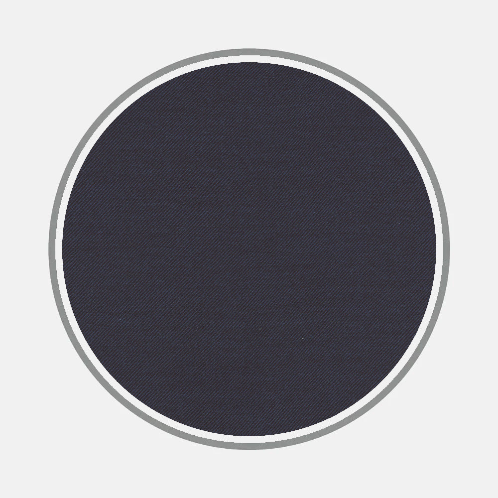 A dark navy blue circle with a subtle diagonal texture is centered on light gray, outlined by two slim silver-gray rings—echoing the refined monogram style of Turnbull & Asser’s Bespoke Fabric 0030 05.