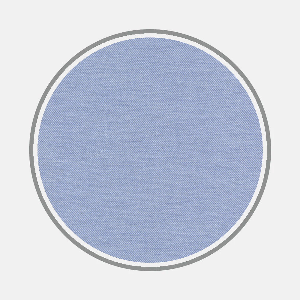 A large, solid light blue circle with a subtle diagonal texture, inspired by Turnbull & Asser's Bespoke Fabric 0030 07, is centered on a light gray background. The circle features a thin white border and a wider gray border for an elegant touch.