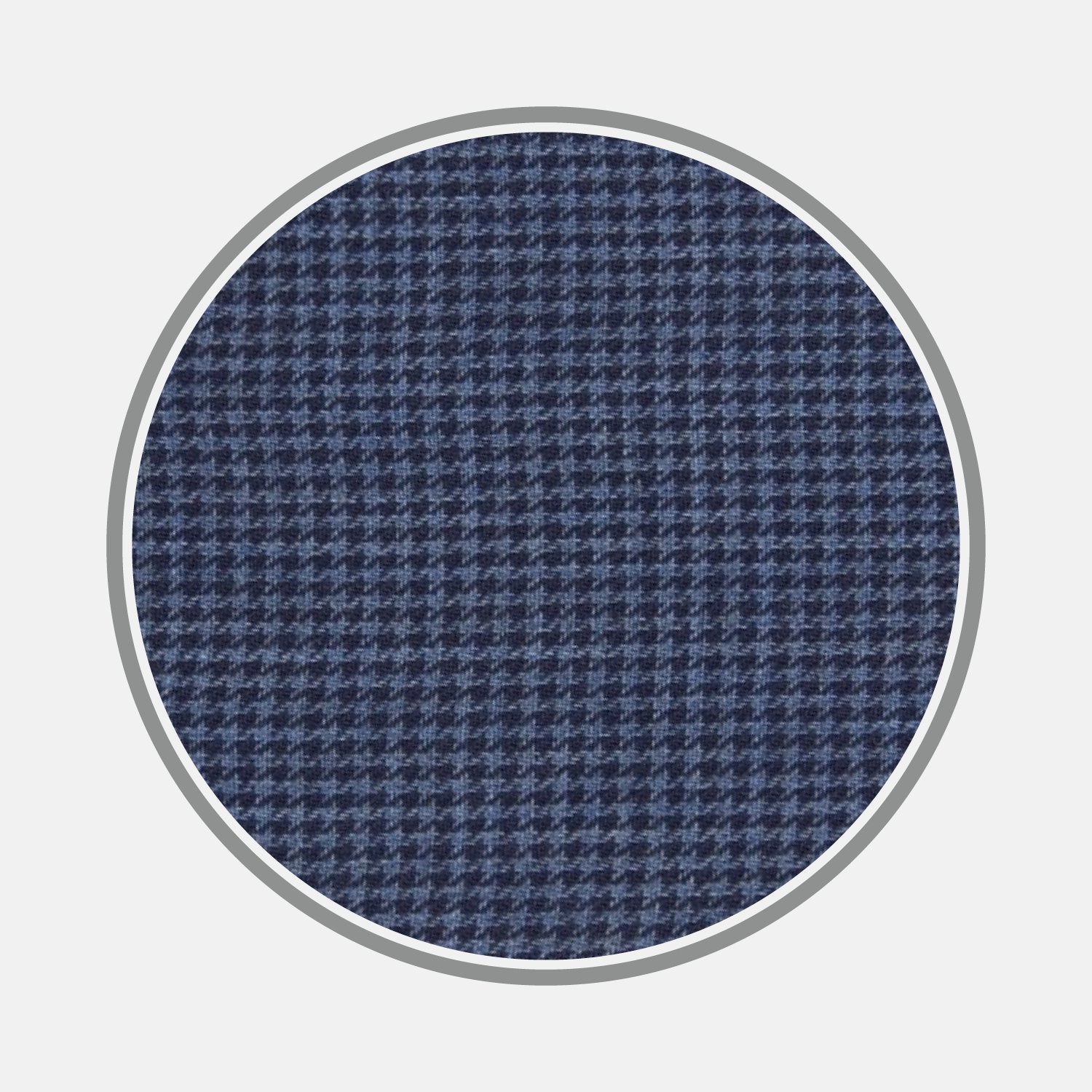 View 1 of product Close-up of Turnbull & Asser's BESPOKE FABRIC 0093 30, highlighting a blue and navy houndstooth weave for bespoke shirts, shown within a circular frame on a light gray background.