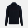 View 3 of product The Turnbull & Asser Midnight Blue Cashmere Shawl Collar Cardigan features ribbed fabric, five black front buttons, a shawl collar, and two front patch pockets, shown against a plain light background.