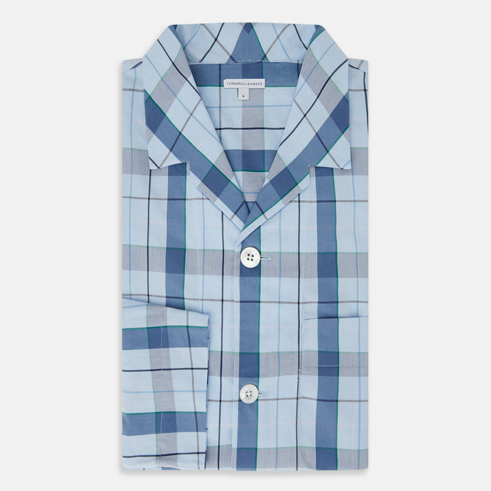 The Turnbull & Asser Blue Multi Check Pyjama Shirt features a blue and white check pattern, long sleeves, and a collar—an elegant loungewear option perfect for nightwear.