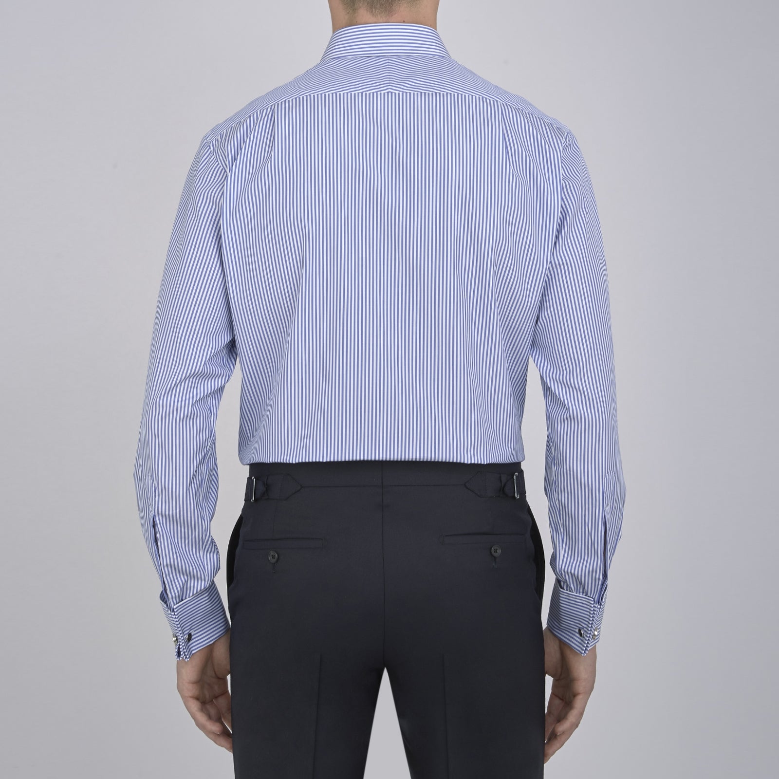 View 5 of product The Turnbull & Asser Blue Bengal Stripe Shirt features a T&A collar, double cuffs, and white buttons on the front for a classic look.