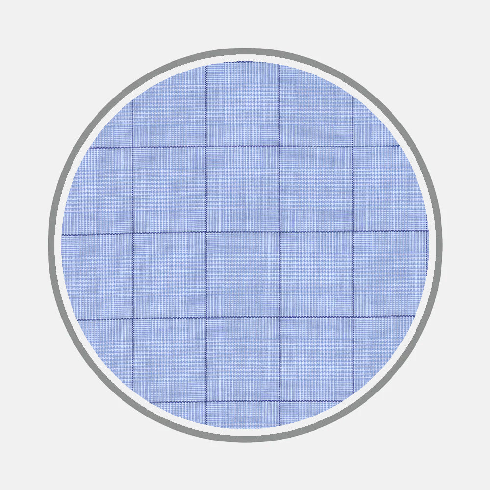 A close-up of Turnbull & Asser's Bespoke Fabric 0125 32, light blue with a grid of thin dark blue lines, ideal for custom shirts. The fabric appears within a circular frame on a plain white background.