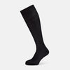 View 1 of product A single Midnight Blue Long Sock by Turnbull & Asser is shown on a white background, showcasing a ribbed texture and a fitted design that extends from the foot to the top of the calf.