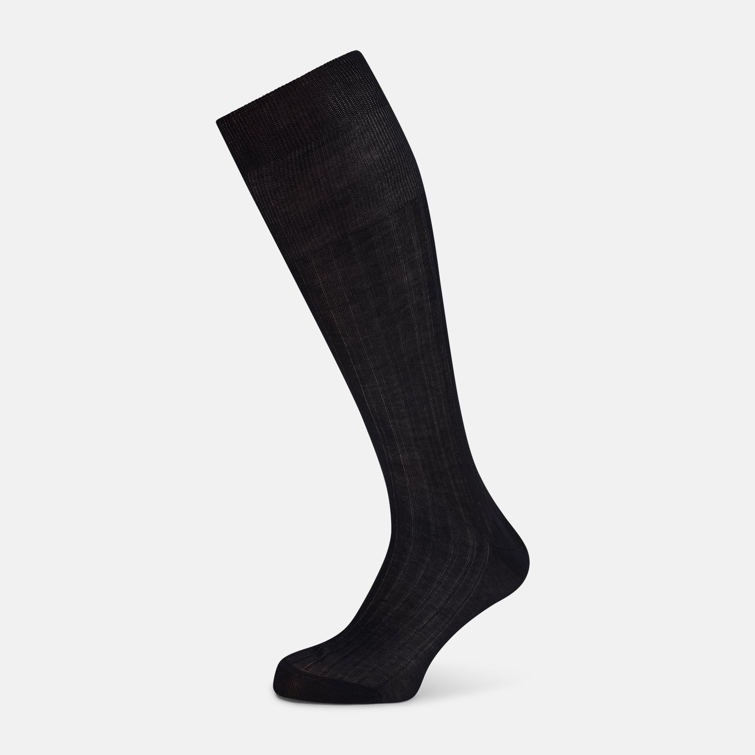View 1 of product A single Midnight Blue Long Sock by Turnbull & Asser is shown on a white background, showcasing a ribbed texture and a fitted design that extends from the foot to the top of the calf.
