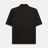 View 3 of product A brown cotton jersey polo shirt by Turnbull & Asser with short sleeves, a collar, three buttons, and a buttoned chest pocket, laid flat on a white background.