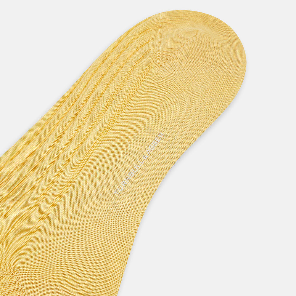 The Turnbull & Asser Banana Mid-Length Sock, made from mercerised Egyptian cotton with a hand-linked toe, is shown upright on a plain white background.