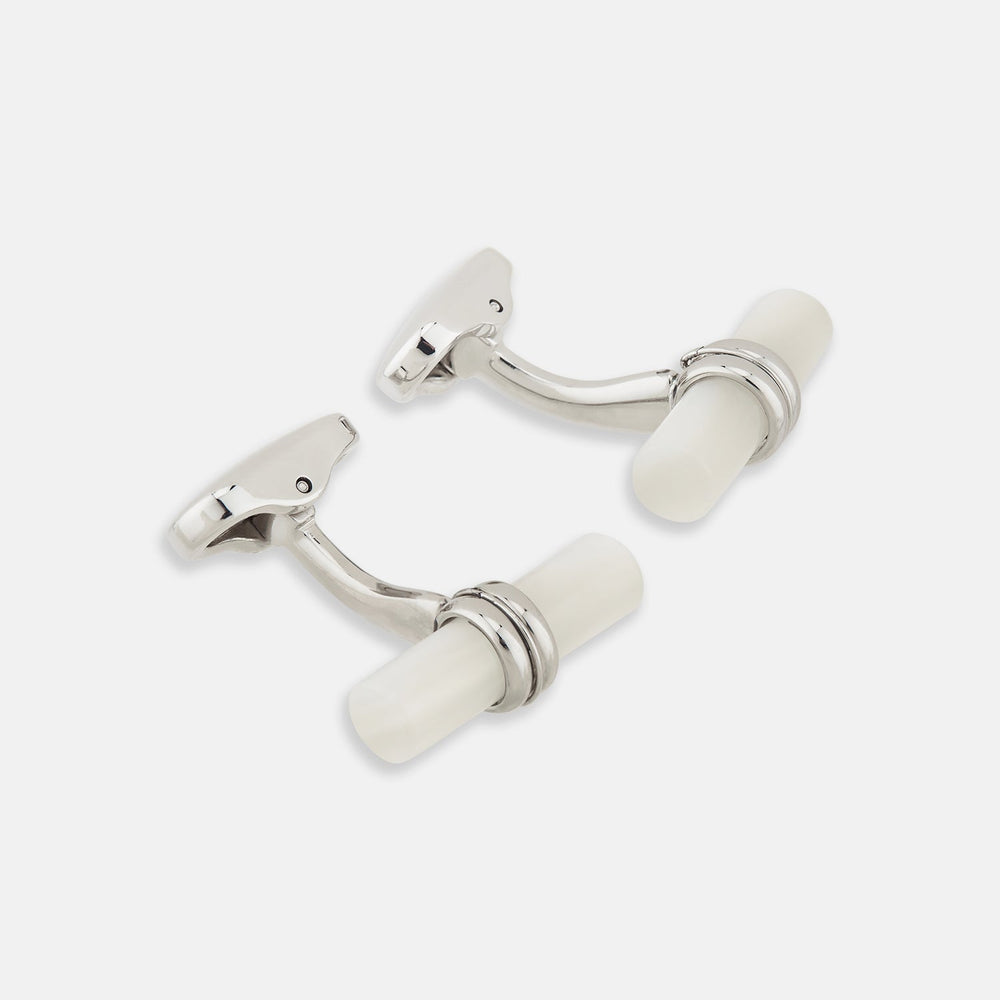Turnbull & Asser Mother of Pearl Handlebar Cufflinks feature sleek cylindrical white bars, elegantly displayed against a plain white background.