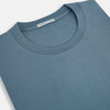 View 2 of product The Turnbull & Asser Pale Blue Short-Sleeve T-shirt features a crew neck and plain design, ideal for everyday wear. Shown flat on a white background.