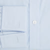 View 4 of product The Turnbull & Asser Light Blue Mayfair Shirt features white buttons, a classic collar, and buttoned cuffs—styled flat on a white background, it’s ideal for minimalist outfits or pairing with bold ties.
