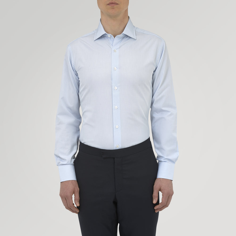 A Tailored Fit Blue Fine Bengal Stripe Shirt with a Kent Collar and 2-button cuffs by Turnbull & Asser, neatly folded and displayed against a plain white background.