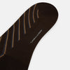 View 3 of product A single Turnbull & Asser Dark Chocolate/cream Diagonal Striped Long Sock, knee-high, is displayed against a plain white background.