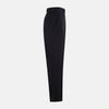 View 4 of product A pair of Midnight Blue Wool Henry Trousers by Turnbull & Asser, with a button closure and straight legs, shown against a plain white background.
