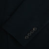 View 4 of product The Forest Green KNITTED CAMBRIDGE BLAZER by Turnbull & Asser, crafted from textured Italian wool with notch lapels, patch and chest pockets, and two buttons, is shown against a plain white background.